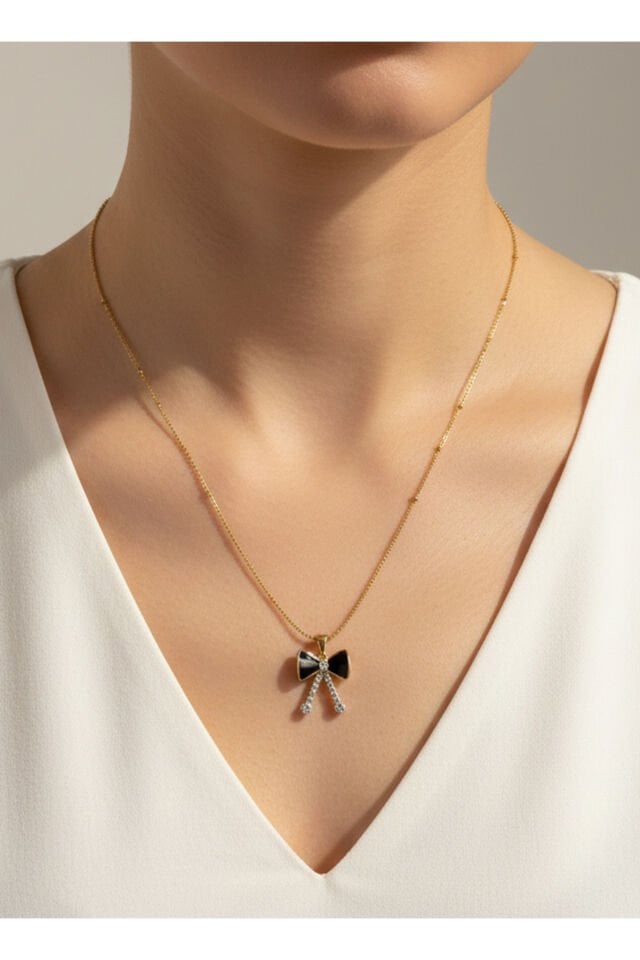 Altın Kaplama Siyah Fiyonk Ve Zirkon Taşlı Çelik Kolye